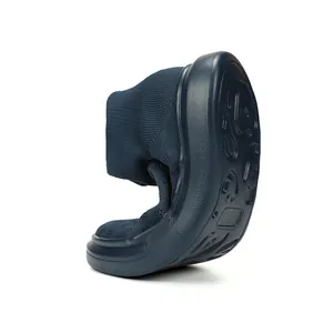 Flexible navy blue knit sock shoes with warm fleece lining and non-slip rubber soles