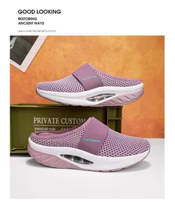 Detail of purple breathable mesh platform clogs with air cushion and FASHION strap