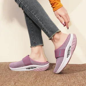Women's purple platform mesh mule sandals with cushioned sole and breathable upper design