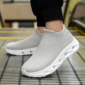 Light gray knit sock sneakers for men featuring a white hollowed-out cushioned sole