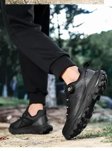 Detail of outdoor sneakers featuring a convenient rotating buckle lacing system and rugged sole