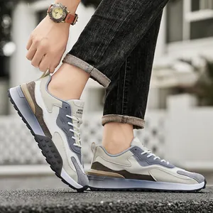 Breathable outdoor hiking sneakers for men featuring multi-material patchwork design