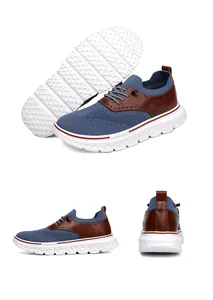 Dettaglio della rete blu e della finta pelle marrone sulle sneakers casual da uomo