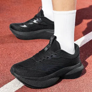 Breathable black professional running shoes with mesh fabric and thick soles on track