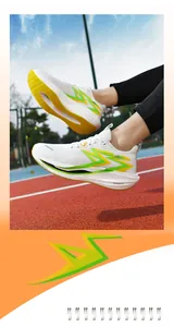 Detailed close-up of FEIRAN 4 running shoes showing mesh upper and green lightning logo