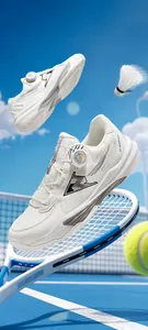 Detail of white athletic shoes with rotary buckle system and breathable mesh upper