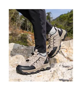 Close-up of khaki outdoor hiking shoe with breathable mesh and deep-tread rubber sole
