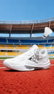 Detail of lightweight athletic shoes showing anti-slip rubber sole and BOA lacing system