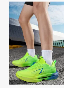 Detail of neon green mesh running shoes with gradient blue heel and side lightning logo