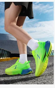 Dynamic side view of neon green mesh running shoes with blue lightning logo and thick sole