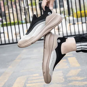 Breathable black knit athletic sneakers with chunky cushioned sole for outdoor walking