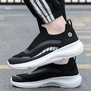 Breathable black knitted slip-on walking shoes with thick white cushioned soles