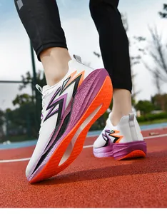 Close-up of marathon running shoe showing breathable mesh and shock-absorbing purple midsole