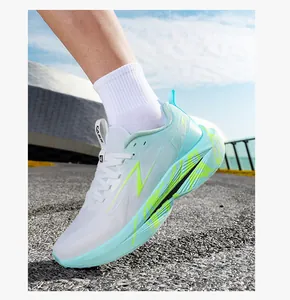 Outdoor view of white mesh running shoes with mint green sole and neon yellow accents