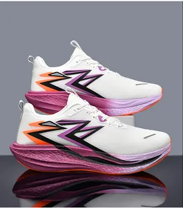 Detail of breathable white mesh upper with purple gradient foam midsole and lightning pattern