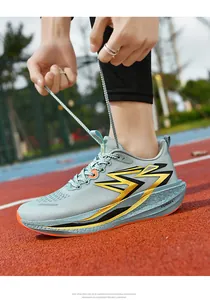 Detail shot of lightweight EVA foam sole on a grey breathable marathon running shoe