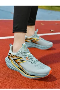 Detail of breathable light blue mesh upper with shock-absorbing midsole for marathon running