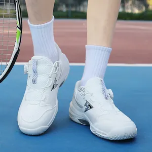 White professional tennis shoes with BOA rotary lace system on outdoor court