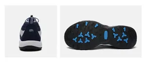 Detailed view of the anti-slip black rubber outsole and breathable mesh heel on trail shoes