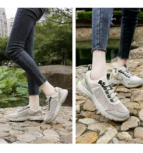 Detailed side view of beige breathable mesh hiking shoes with anti-slip rubber outsoles