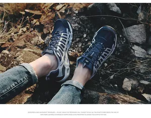 Close-up of lightweight navy mesh hiking shoes with TPU support and thick cushioned soles