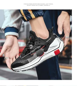 Detailansicht trendiger Leder-Patchwork-Chunky-Sneaker mit rotem Farbakzent