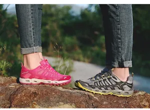 Detail of breathable mesh upper and anti-slip sole on outdoor wading shoes for hikers