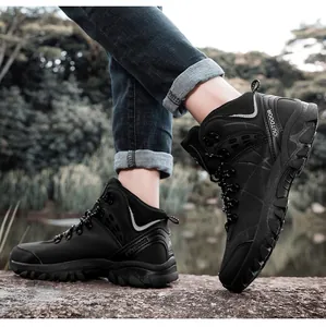 On-foot view of black high-top outdoor hiking boots with anti-slip rubber soles