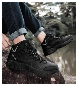 Outdoor hiking boot with thick anti-slip sole shown on rocky terrain outdoors