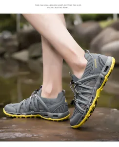 Detailed view of quick-lace system and breathable gray mesh on outdoor water shoes