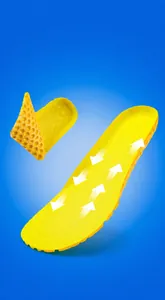 Close-up of bright yellow honeycomb breathable insoles with high elasticity and cooling airflow