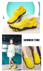Detail of yellow kids water shoes featuring breathable mesh and grippy rubber sole