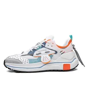 Modische Herren Sneaker aus Leder-Patchwork mit blauen und orangen Akzenten