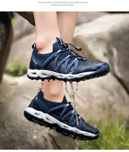 Close-up of quick-dry water shoes with mesh upper and side drainage holes for drainage