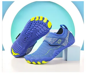 Detail of blue breathable mesh kids water shoes with non-slip sole and hook-and-loop strap