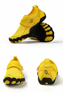 Detail view of yellow water shoes with mesh upper and durable non-slip rubber sole
