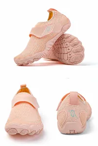 Pink barefoot water shoes for kids with breathable mesh, velcro straps, and non-slip rubber soles