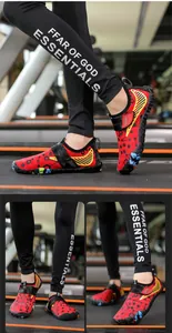 Detail of red quick-dry barefoot shoes with velcro strap for gym workout