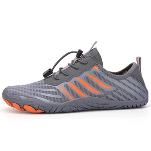Quick-lace outdoor swimming shoes in dark grey with orange anti-slip rubber soles