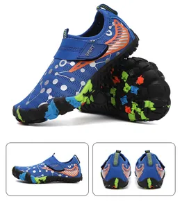 Detail of blue quick-dry kids water shoe with orange flame pattern and anti-slip sole