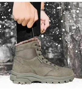 Detail of warm plush lining and durable suede on men's outdoor winter snow boots
