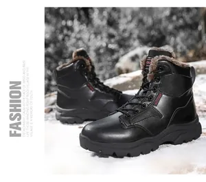 Detail of warm faux fur lining inside black outdoor boots on snowy ground
