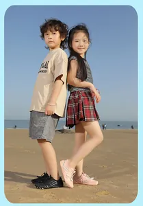Close-up of non-slip soles on kids water shoes for beach and outdoor creek trekking