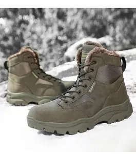 Detail of army green outdoor snow boots with thick faux fur lining and anti-slip rubber sole