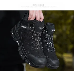 Close-up of durable rubber sole with deep treads on black hiking shoes for outdoors
