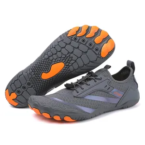 Outdoor barefoot water shoes in grey and orange with quick-dry mesh and non-slip rubber sole