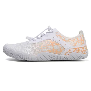 Chaussures d'eau blanches à séchage rapide avec motif orange et semelle antidérapante