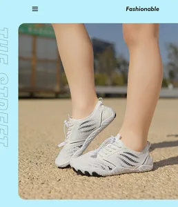 Outdoor low-angle view of kids water shoes with breathable mesh and anti-slip rubber soles