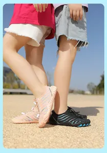Detail of non-slip rubber soles and breathable mesh on children water shoes