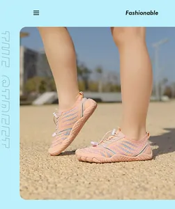 Pink kids quick-dry water shoes with breathable mesh and adjustable bungee lace toggle